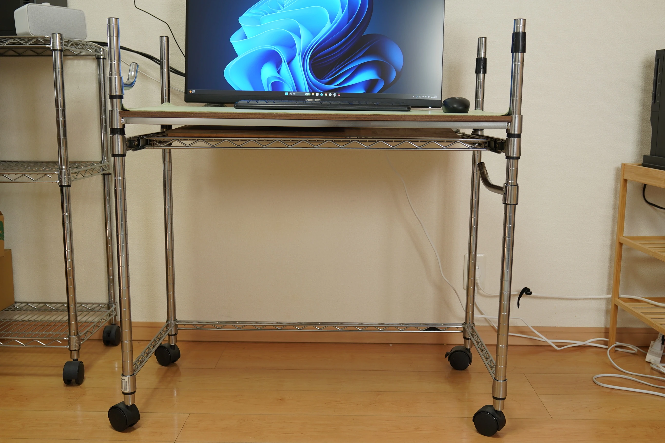 The full rack-style desk, showing its tall uprights and the drawer attached beneath the desktop